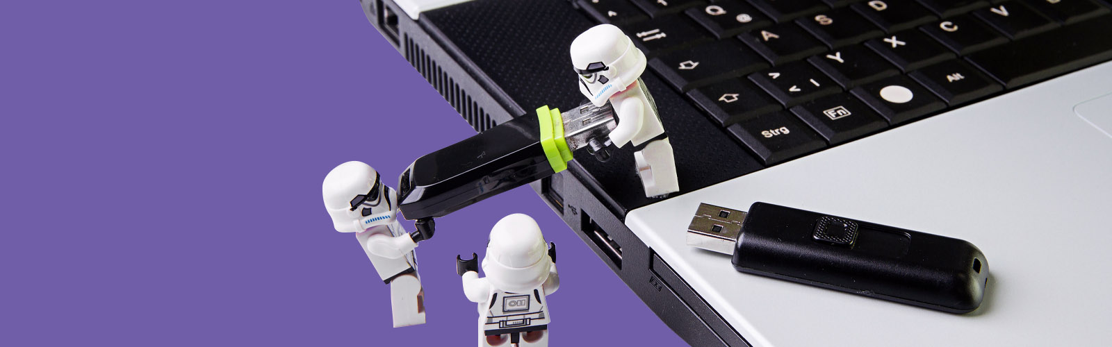 Lego Stormtroopers plugging in a USB stick