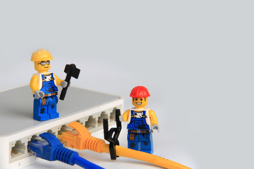 Lego men fixing slow WiFi