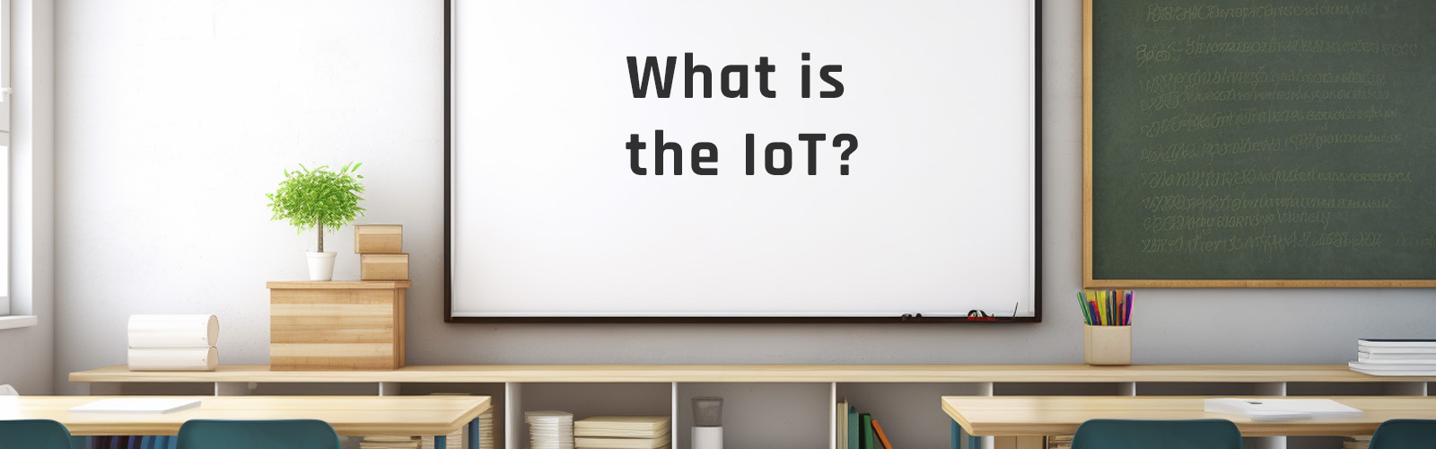 Smart Whiteboard displaying the question "What is the IoT?" in a classroom powered by IoT in education